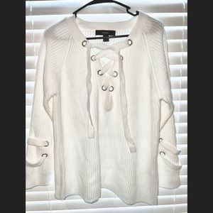 Brand new white sweater, cross tie in the front, unique details on the sleeves.